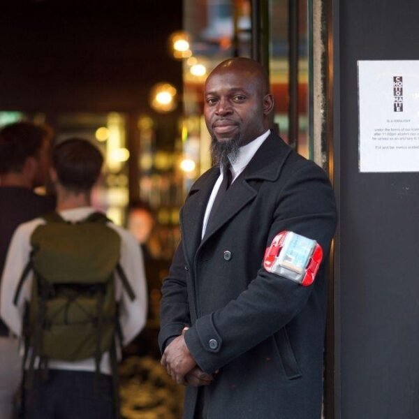 Black man in a coat | Dynamiseducation.co.uk