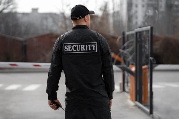 Security guard outside | Dynamiseducation.co.uk